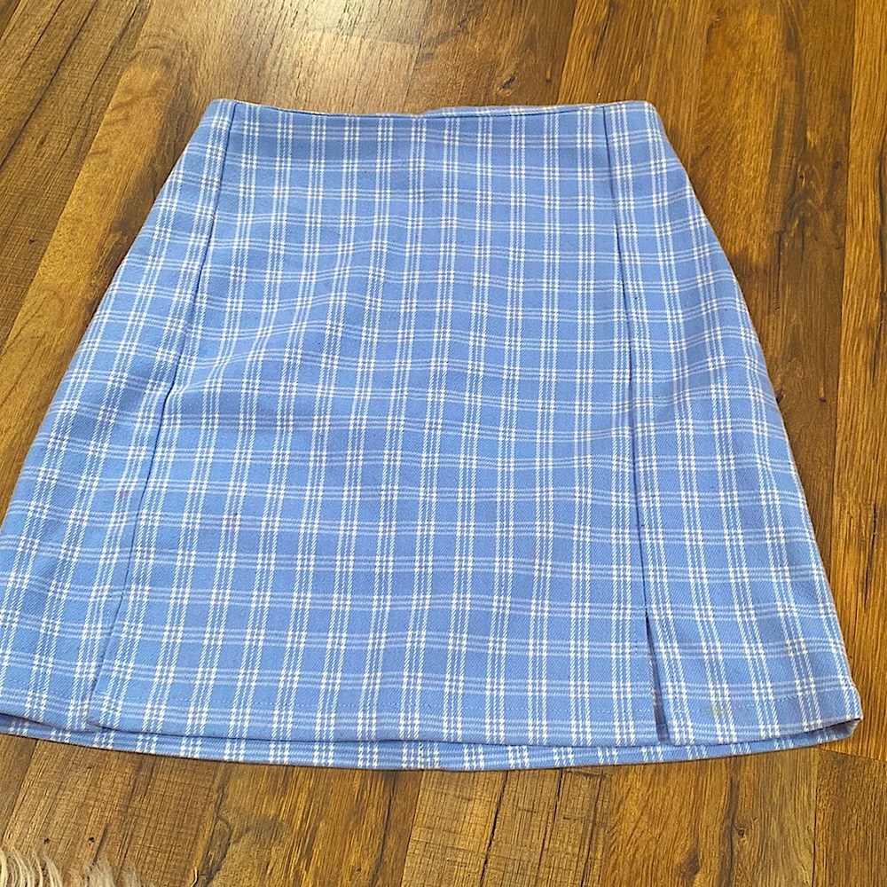 This is a plaid skirt from Brandy Melville.  It’s a size 10 with no tags.